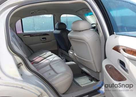 1999 Lincoln Town Car Cartier from USA, damaged, VIN 1LNHM83W3XY654925